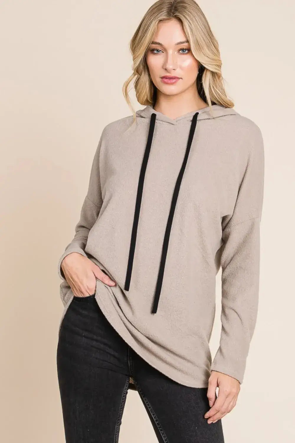 taupe knit hoodie featuring a soft muted gray fabric with a bombom contrast drawstring and contrast drawstring drop in black.