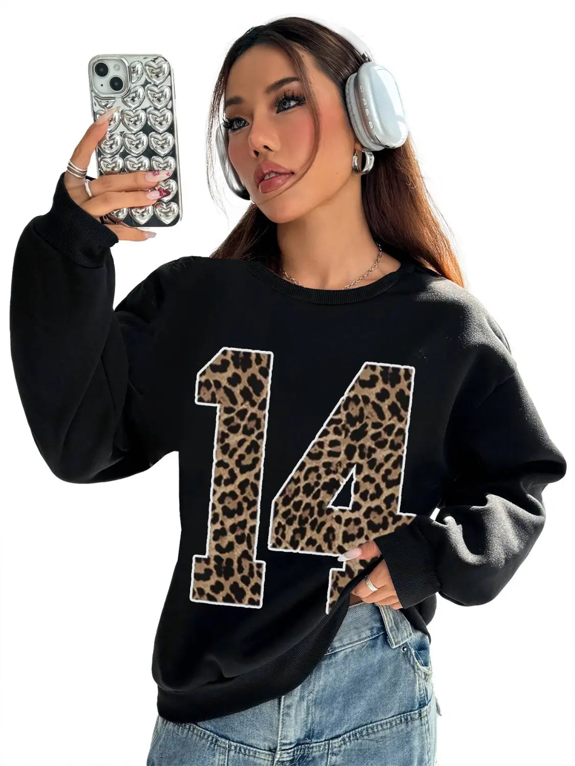 Black crew neck sweatshirt featuring a bold leopard-print number 14 on the front.