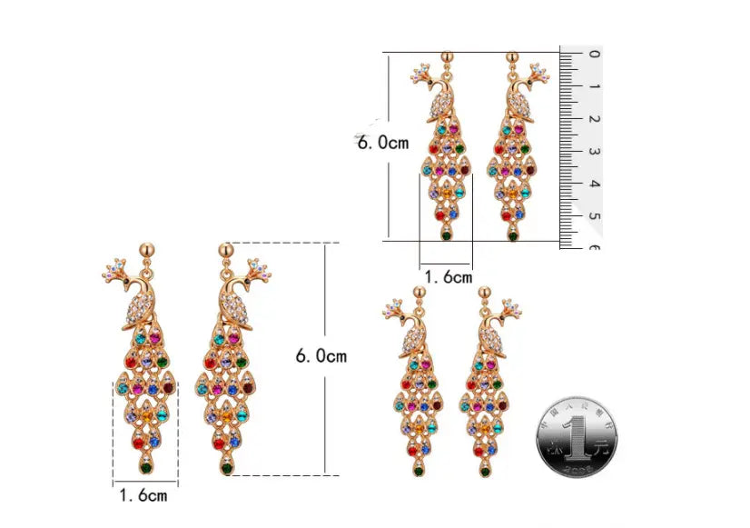 Gold-toned peacock-shaped drop earrings adorned with multicolored rhinestones and a small green accent from the creative crystal peacock bridal jewelry set.