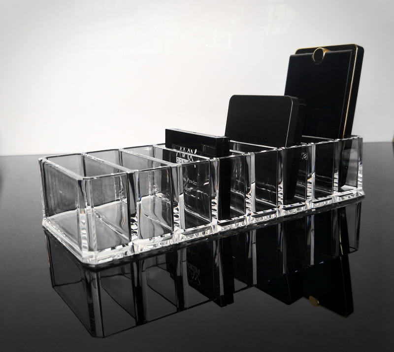 Clear acrylic makeup organizer with multiple compartments designed for phone and tablet storage in a transparent finish organizer image