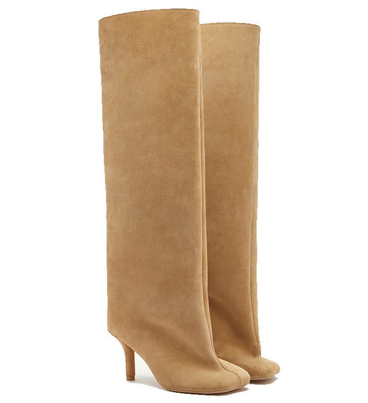 Tan suede knee-high boots with a sleek minimalist design, slender heels, and simple stitching square head details for yards custom styling.