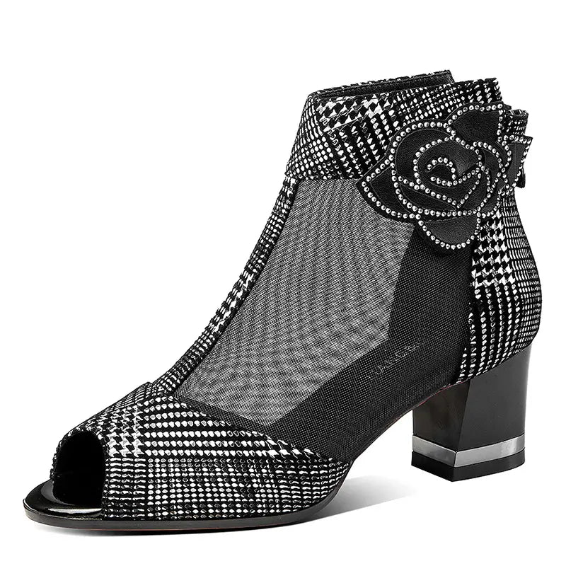 Black peep-toe ankle bootie fish mouth heel sandals mesh featuring a black mesh upper adorned with sparkling rhinestones and a decorative rose appliqué.
