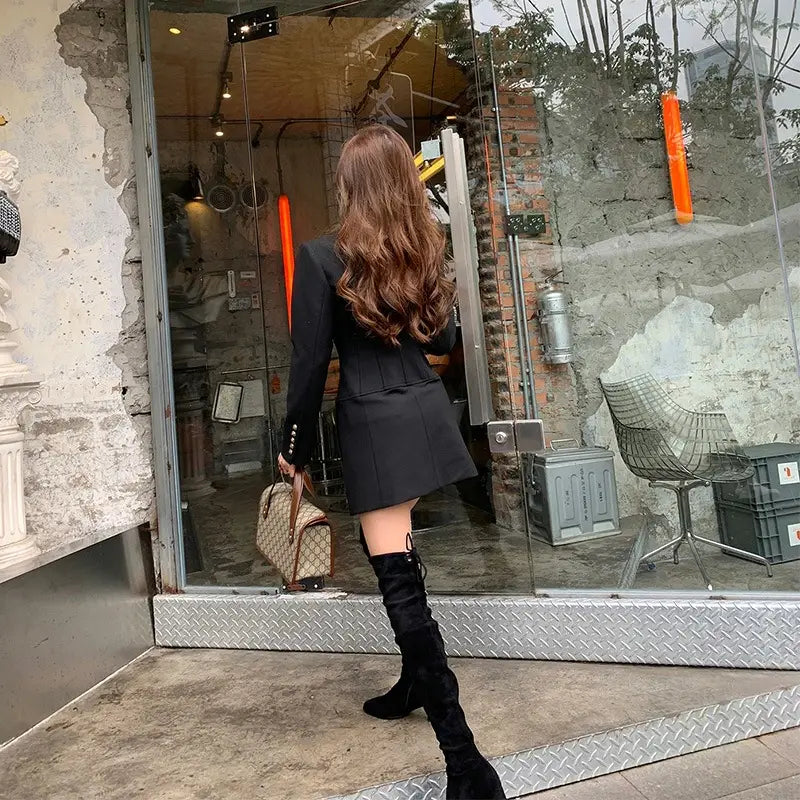 black over-the-knee suede boot paired with lightly cooked style black gold button blazer dress for cooked style ladies.