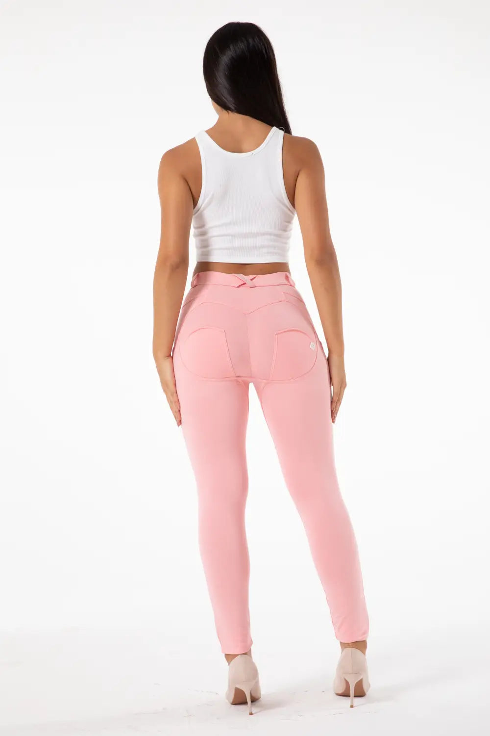 back view of blush pink melody hot shaping leggings featuring high-waisted design with a bow and two rear pockets for enhanced style and functionality