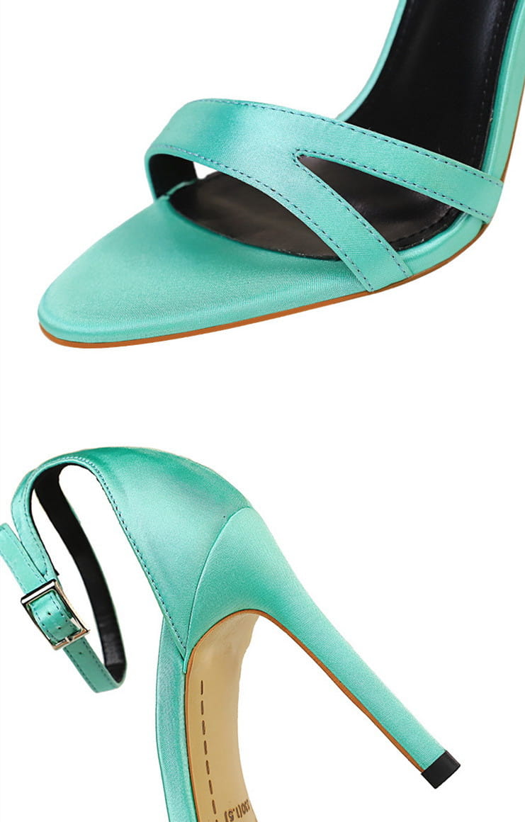turquoise satin high heel toe sandals with a sleek pointed toe and ankle strap complement black satin high heel toe cutout sandals.