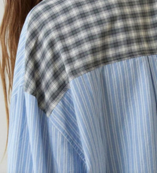 women’s pink muted plaid shirt outfit dressing gown featuring a blue and white vertically striped blouse with a contrasting black and white checkered shoulder panel, ideal for a gown plaid shirt or dressing gown plaid look.