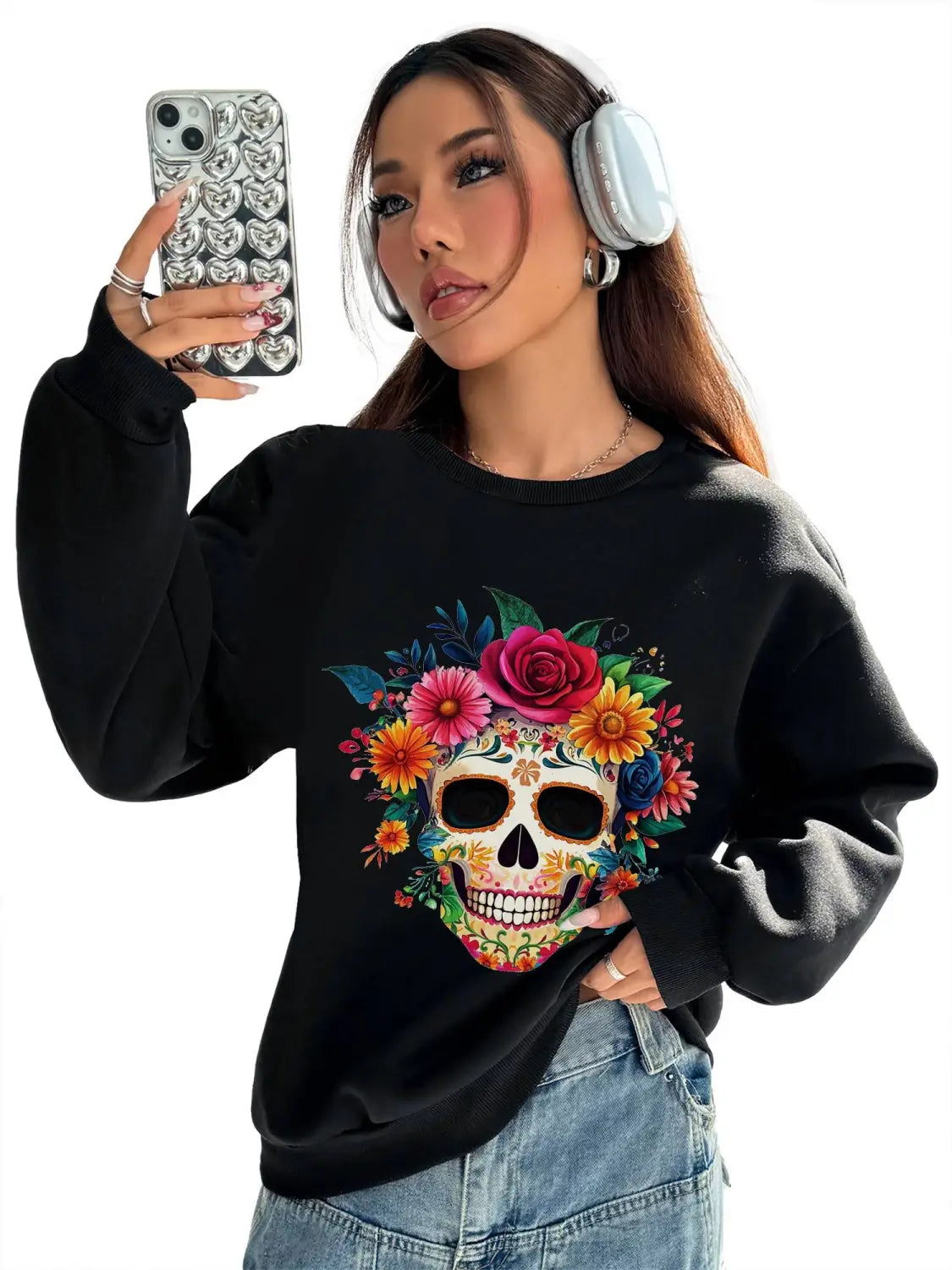 black crew neck sweatshirt for daily wear featuring a vibrant colorful sugar skull design adorned with flowers and foliage