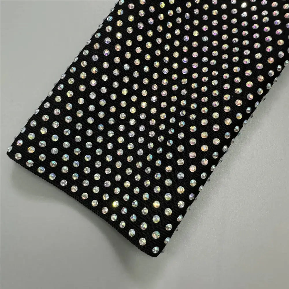 Black stretch fabric sexy rhinestone bandage long sleeve mini dress featuring a dense sparkling array of clear rhinestones ideal for dress cross border and cross border foreign fashion.