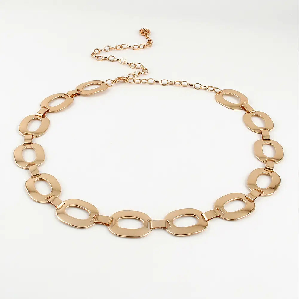 gold-toned metal waist chain featuring oval links with a sleek modern design perfect as summer jewelry waist chain.