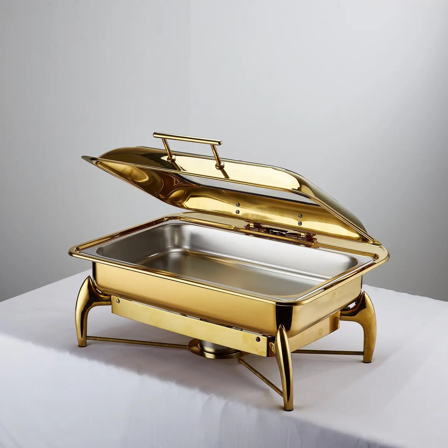 gold stainless steel hotel restaurant bufei buffet stove featuring a gold-colored chafing dish with hinged lid and decorative legs made of stainless steel.