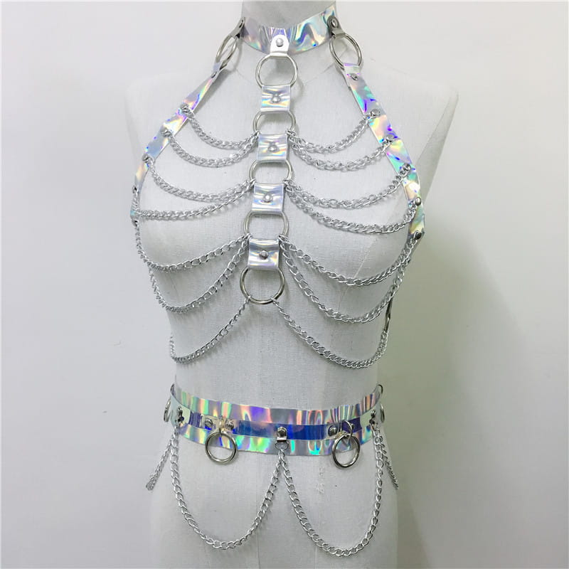 Iridescent holographic chain harness featuring silver metallic chains and rings as part of a creative versatile laser ladies belt bodysuit.