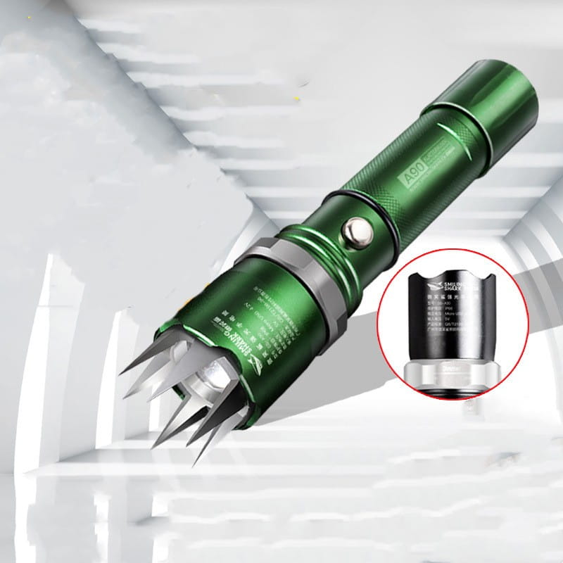 Green metallic spiked tactical self-defense led flashlight with silver accents designed for self-defense use.