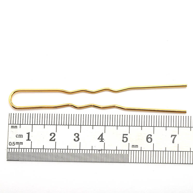 gold-colored metal hairpin with a wavy curved design for diy hair accessories material and hair accessories use