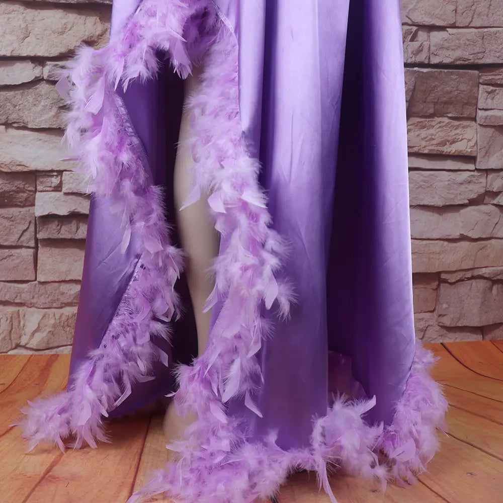 a flowing lavender satin loose dress luxury fully adorned with a delicate fluffy feather trim along its hem and side edges luxury fully surrounded by feathers