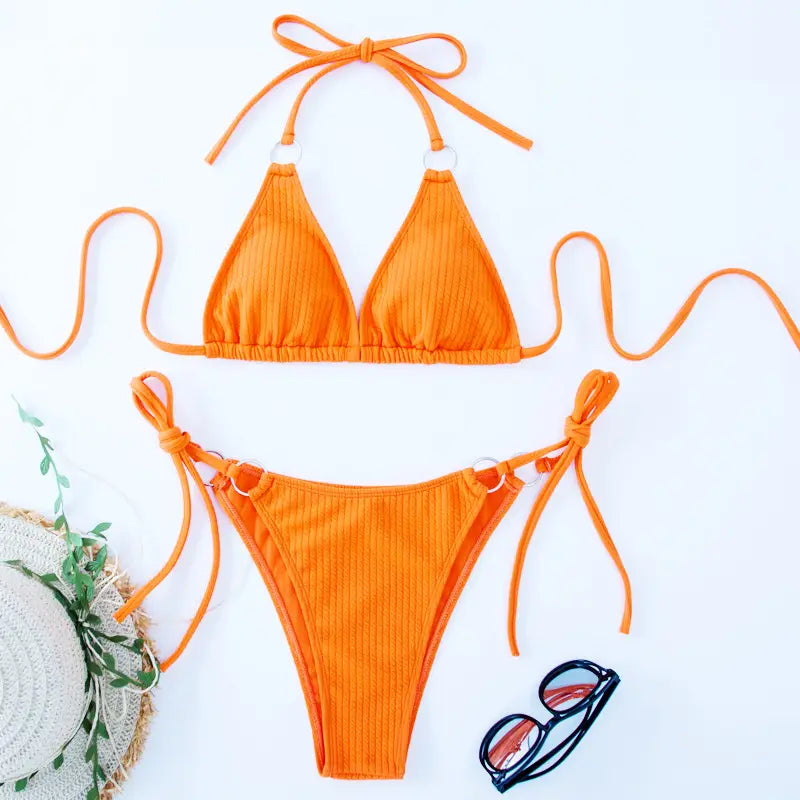 Vibrant orange ribbed sexy bikini set with adjustable tie thong bandage straps and silver ring accents perfect for bikini set summer.
