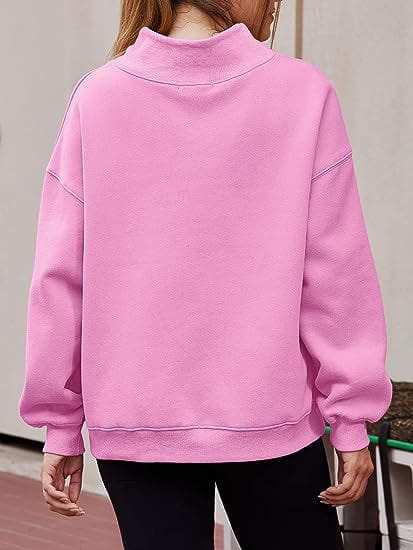 Pink oversized turtleneck pullover sweatshirt solid color made of soft cotton material with a relaxed fit and sweatshirt solid color design.