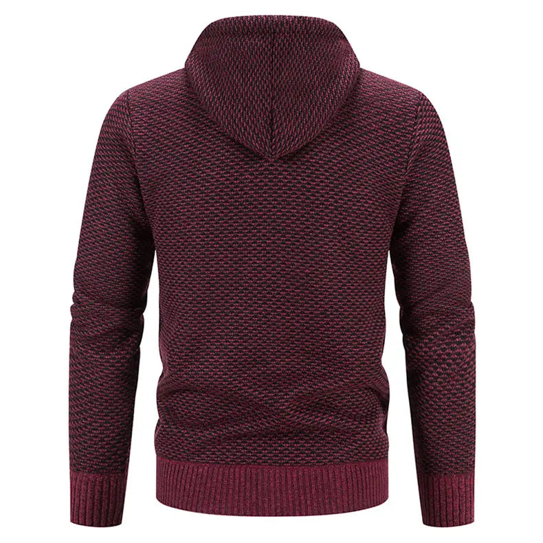 Maroon textured knit hoodie with ribbed cuffs and hem paired with a gray thicken winter coat featuring a coat zipper closure and plush hoodie.
