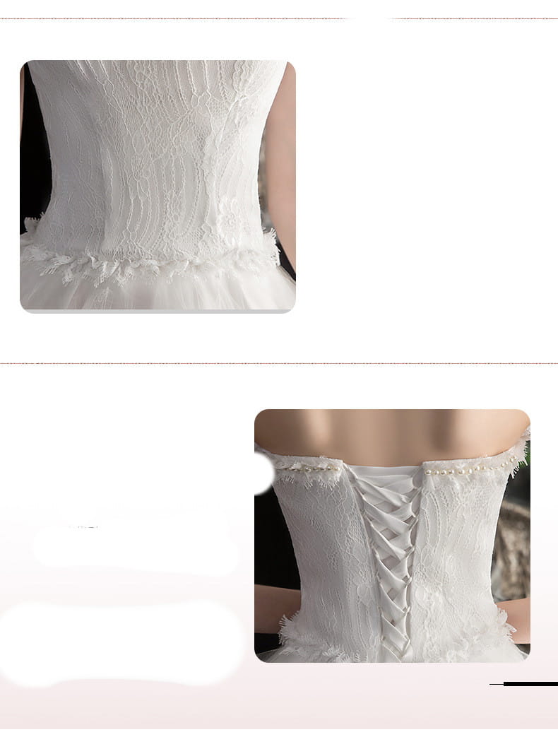 Back view of a white lace small trailing wedding dress featuring a corset-style back and layered tulle with delicate frayed trim.