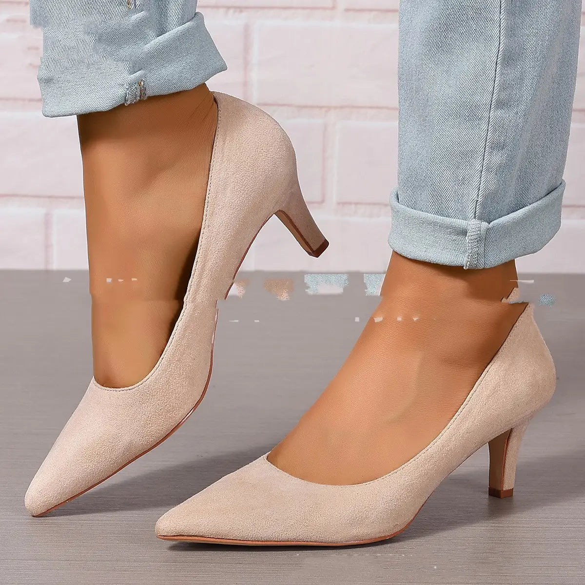 Beige suede pointed toe pumps with a modest stiletto heel for fashion ladies stiletto use.