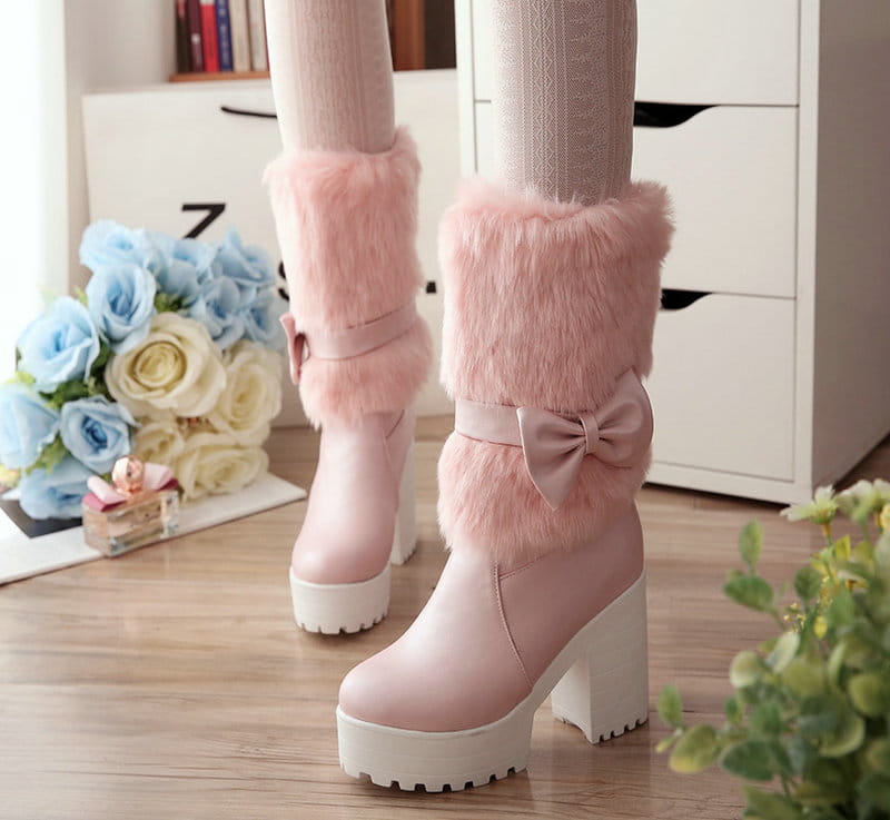 pink platform sweet bow boots featuring fluffy pink faux fur cuffs and matching bow details designed as heel snow sweet footwear