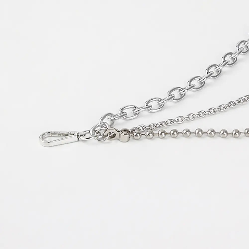 Silver-toned silver chain belt featuring oval link and ball-chain sections with secure clasp for summer body jewelry and jewelry hip hop style.