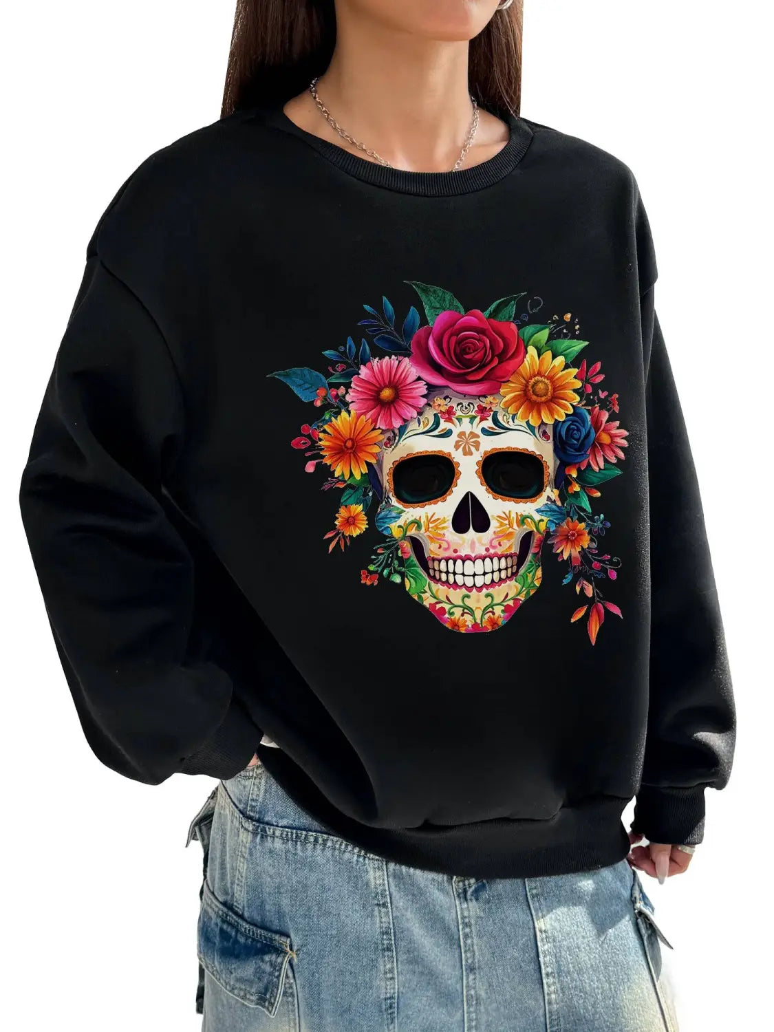 Black basic long sleeve crew neck sweatshirt featuring a vibrant colorful floral skull design ideal for daily wear.