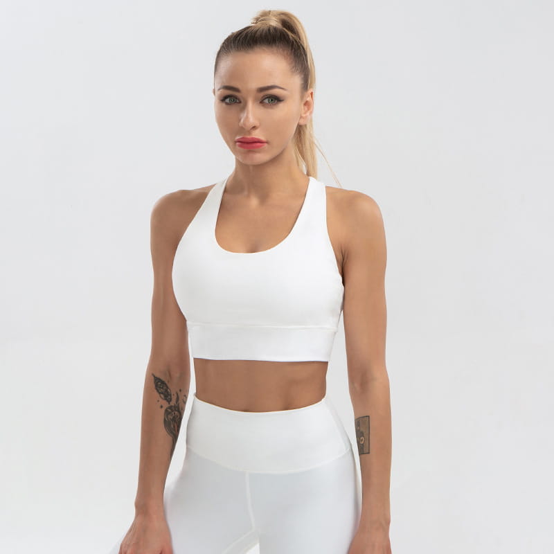white seamless sports bra with racerback design for women’s shockproof running and yoga activities