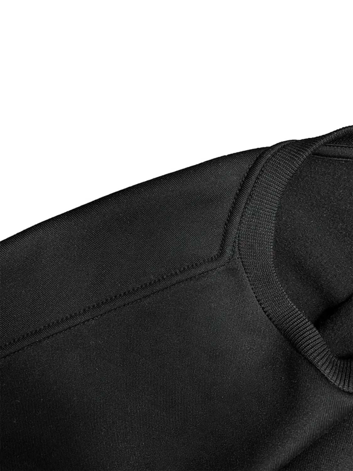 Black cotton crewneck pocketed long sleeve sweatshirt with ribbed neckline and shoulder seam featuring white glitter lips design.