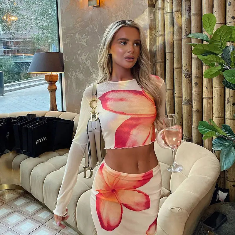 elegant slim print white crop top and matching skirt set with vibrant pink and orange floral print featuring a slim print round neck design