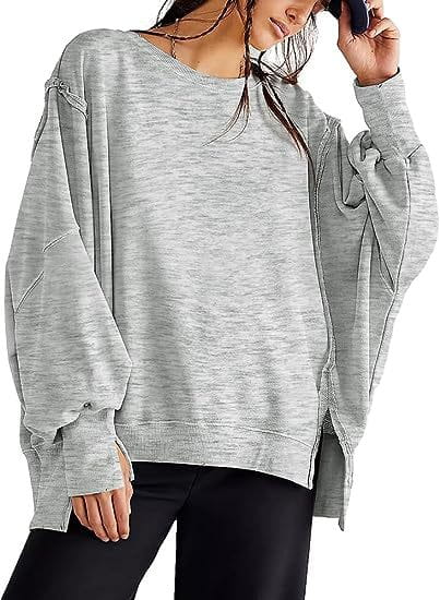 gray heathered solid oversized sweatshirt with long sleeves, relaxed fit, and side zippers, featuring a crew neck design