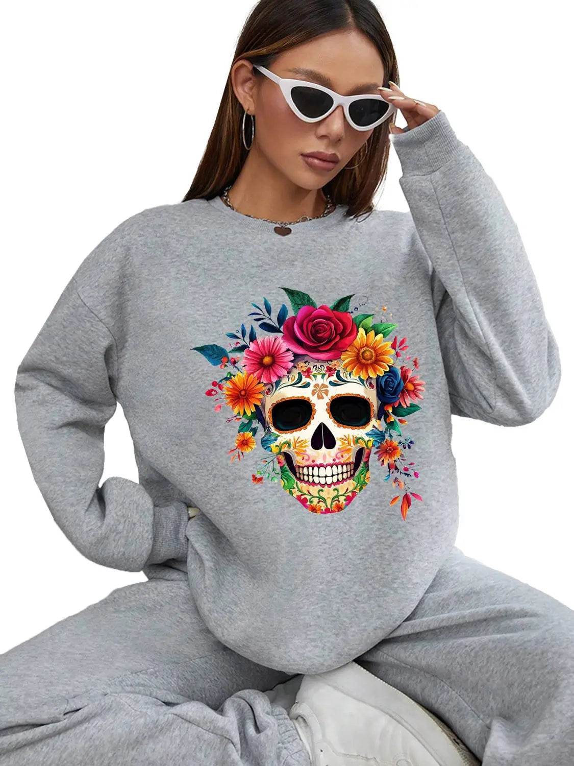 Gray crew neck sweatshirt with a vibrant colorful floral skull design suitable for daily wear basic long sleeve apparel.
