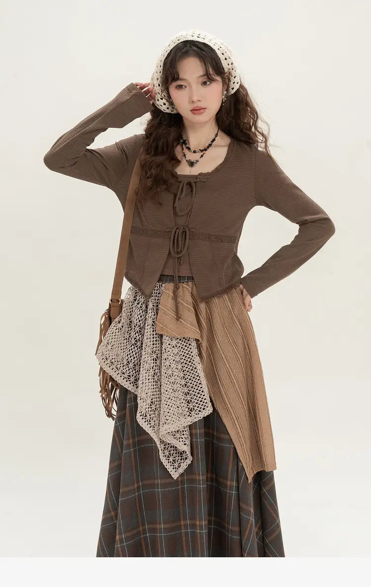 brown knit cardigan with tied front and ribbed cuffs paired with retro minority irregular plaid a line skirt.