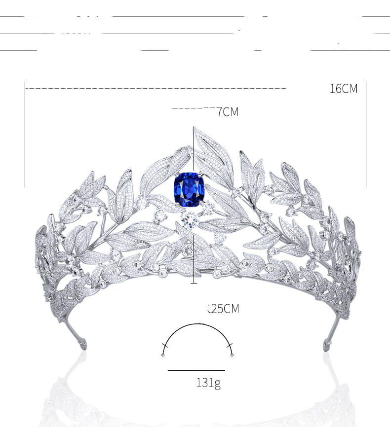 A sparkling silver tiara featuring copper micro inlay with intricate leaf designs and a central deep blue sapphire crown copper gemstone.