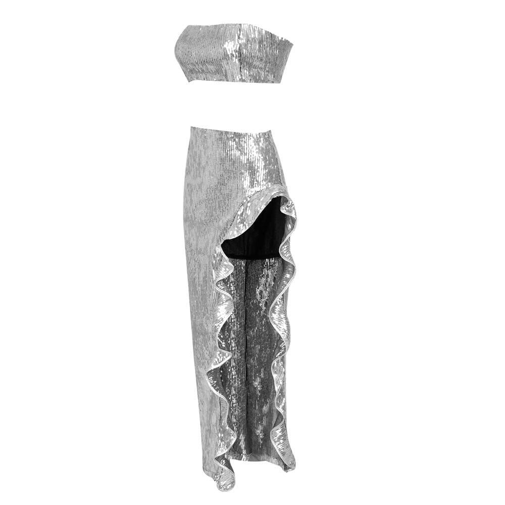 Silver strapless sequin skirt set featuring a two-piece design with a sequined top and a high-slit skirt with ruffled hem.