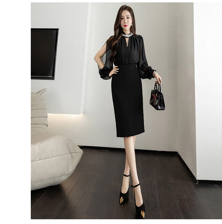 Black satin sheath skirt elegant with sheer long sleeves and keyhole neckline featuring a line sheath skirt design.