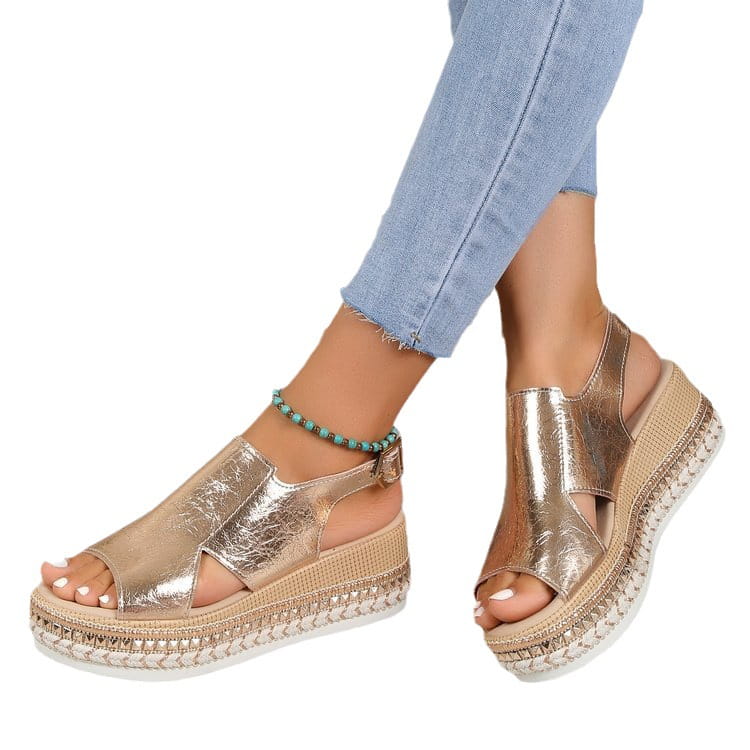 Gold metallic plus size rope wedge sandals featuring a woven espadrille sole and a crisscross strap design.