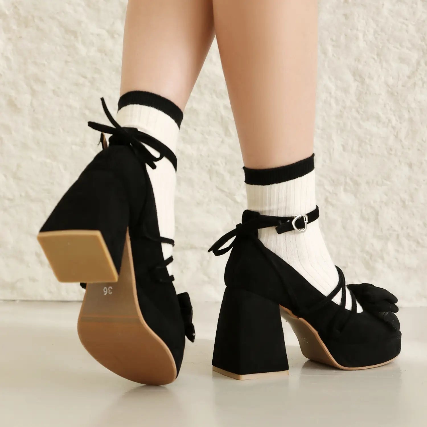 Black suede platform lolita heels with lace-up straps and small size bow details