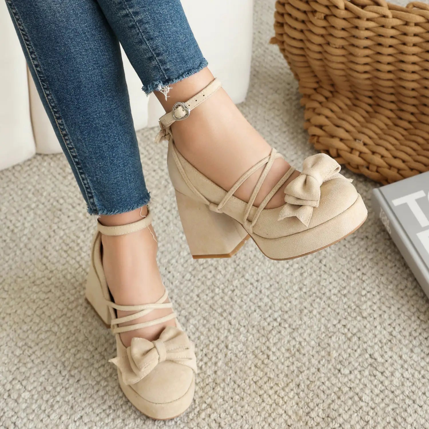Beige platform lolita heels with lace-up straps and a small size bow on the toe.