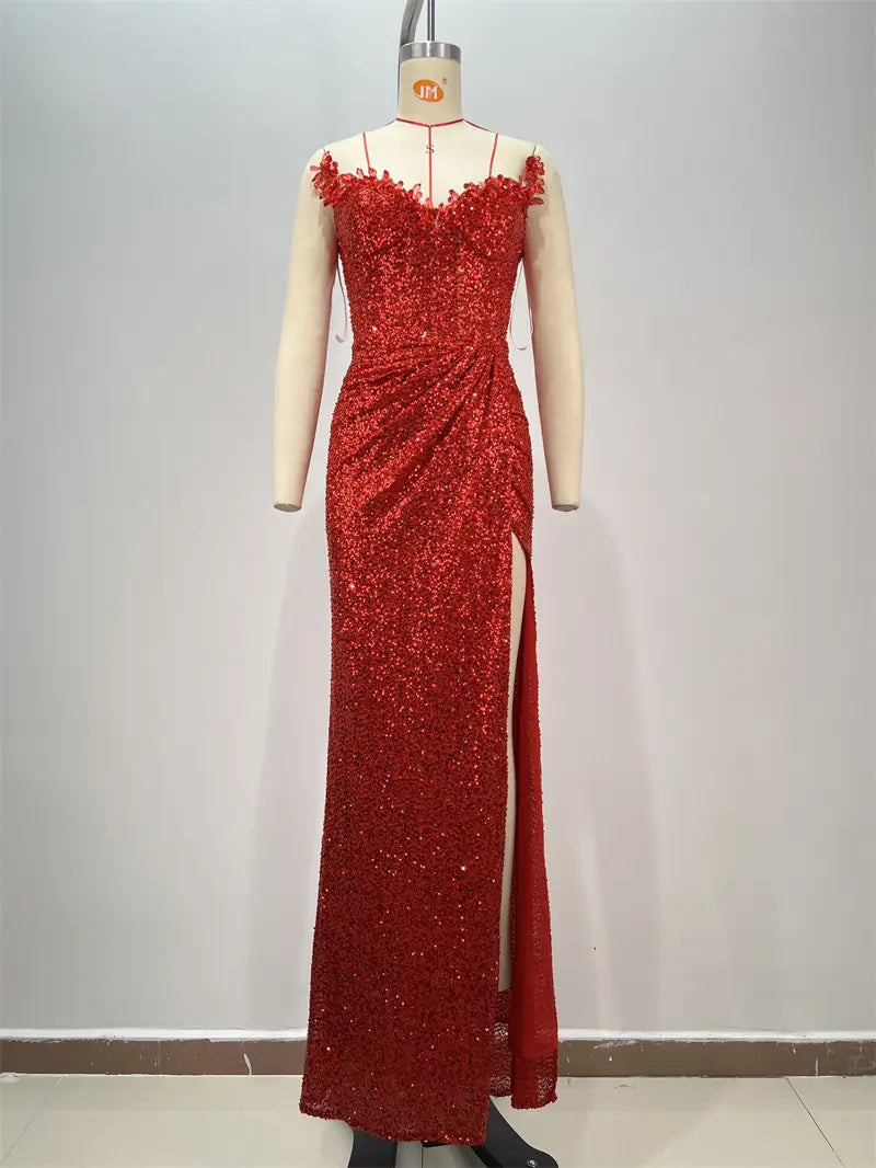 a shimmering red paillette tube evening gown featuring a fitted bodice, off-the-shoulder straps, and a high slit red satin detail along the side