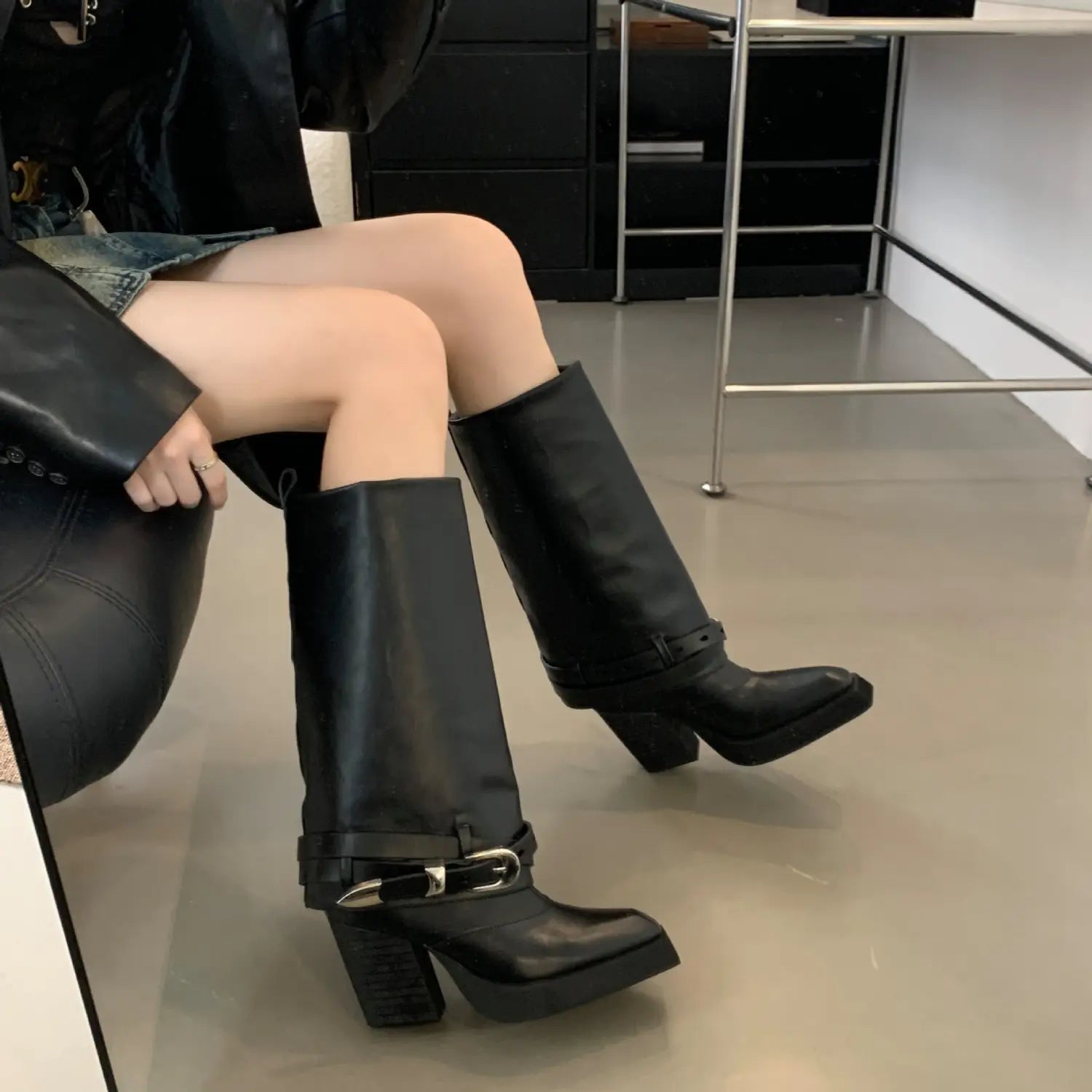 black pointed toe chunky heel knee-high leather boots with silver-toned buckle accents for winter pointed toe style