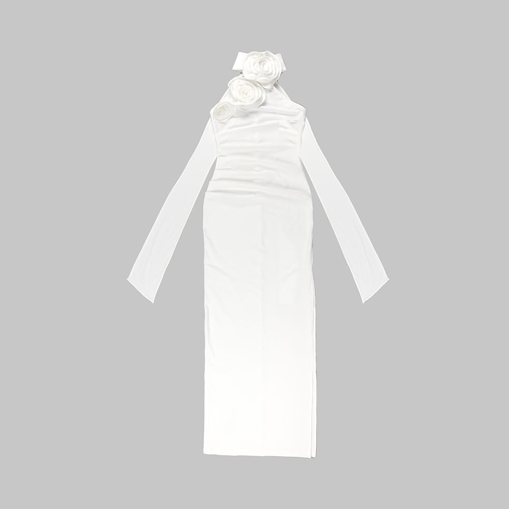a sleek white satin ribbon flower halter gown with long sleeves and a high neckline adorned with three dimensional fabric roses at the collar