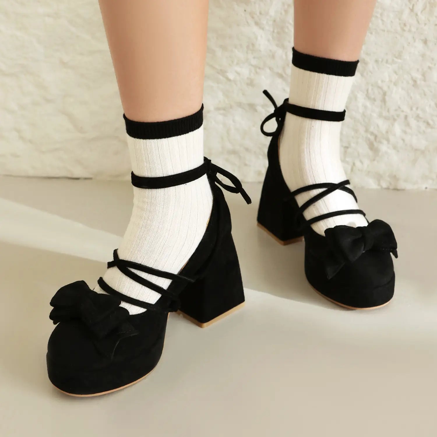 black suede mary jane heels with chunky block heels and decorative small size bows on the front complement platform lolita fashion styles.