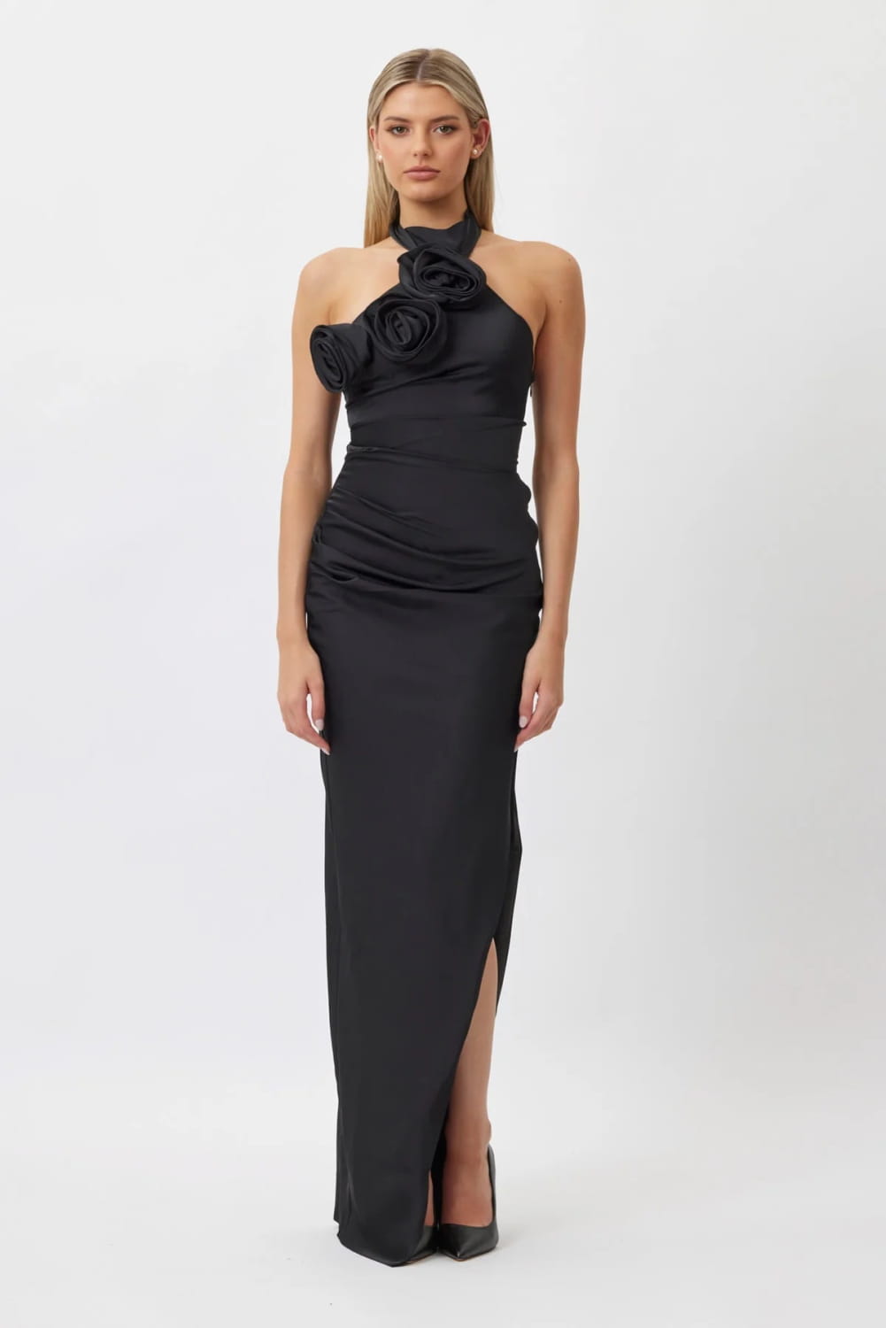 black satin halter-neck gown featuring a sculpted rose white ribbon flower embellishment at the shoulder for an elegant ribbon flower halter style