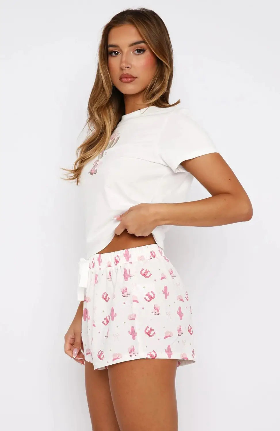 white fox shorts sweetheart pajamas featuring a soft cotton fabric with a white base and pink cactus and crown sweetheart pajamas printing pattern in a pajamas printing suit.