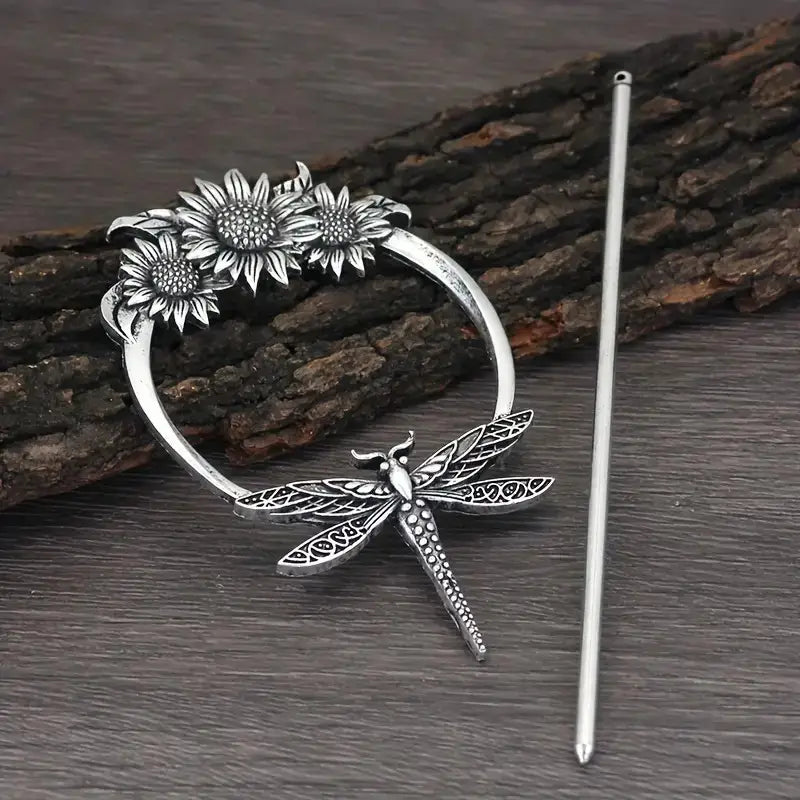 Silver viking barrette featuring a silver dragonfly and sunflower design with intricate filigree detailing made from animal alloy.