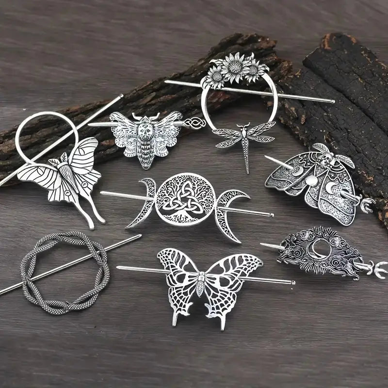 Silver-toned female viking barrettes made of animal alloy featuring intricate designs of butterflies, moths, dragonflies, and moon phases.