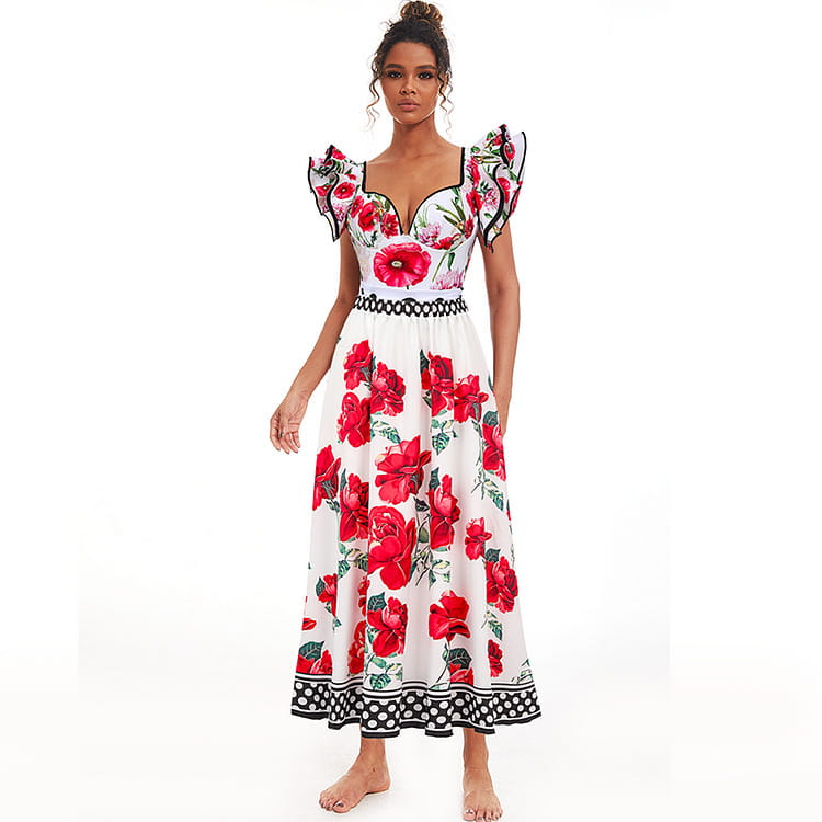 A white chiffon polyester printed floral maxi dress with vibrant red poppies and green leaves featuring ruffled cap sleeves, a black chain belt, and a polka-dot hem.