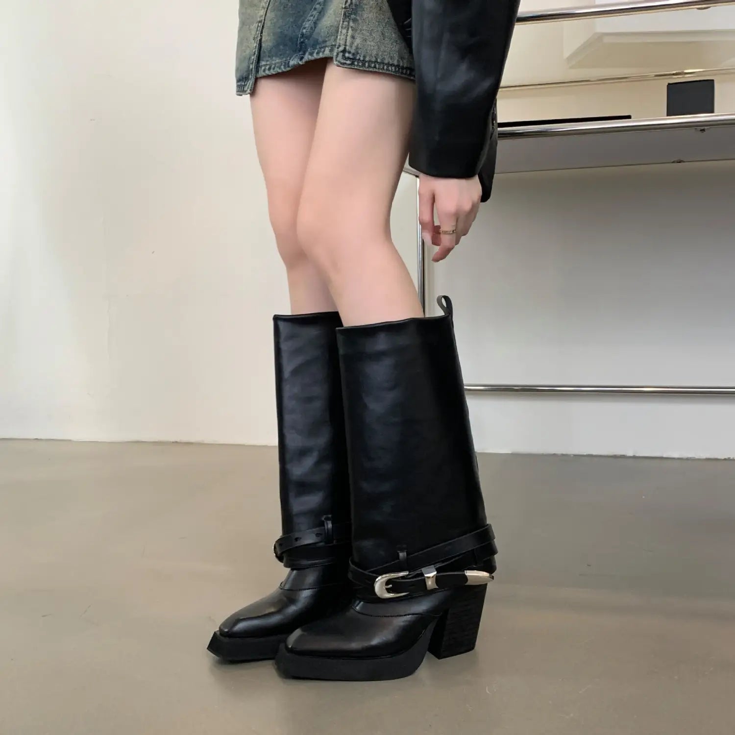 black leather knee-high pointed toe chunky heel knight boots with silver buckle accents suitable for winter pointed toe styles