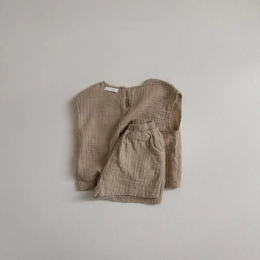 beige cotton muslin breathable vest shorts set featuring a sleeveless top and matching breathable vest shorts designed for comfort and airflow.