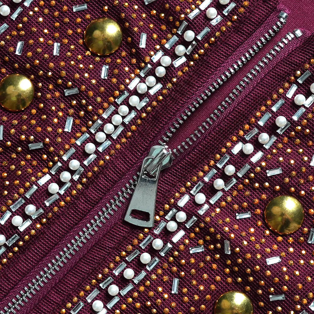 a maroon solid color hot drilling plus size two piece set featuring fabric adorned with gold studs clear rectangular rhinestones and white pearl-like beads along a silver zipper